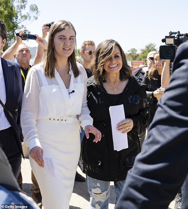 Brittany Higgins compared herself to Tibetan monks who set themselves on fire in an leaked outline of $325,000 book Brittany Higgins (left) first made public her allegations against Bruce Lehrmann in an interview with Lisa Wilkinson (right). They are pictured together at the March4Justice rally in March 2021