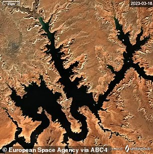 Incredible satellite images shows how previously-drought stricken Lake Mead has risen by FORTY-FOUR feet thanks to historic winter storms Lake Powell on March 18