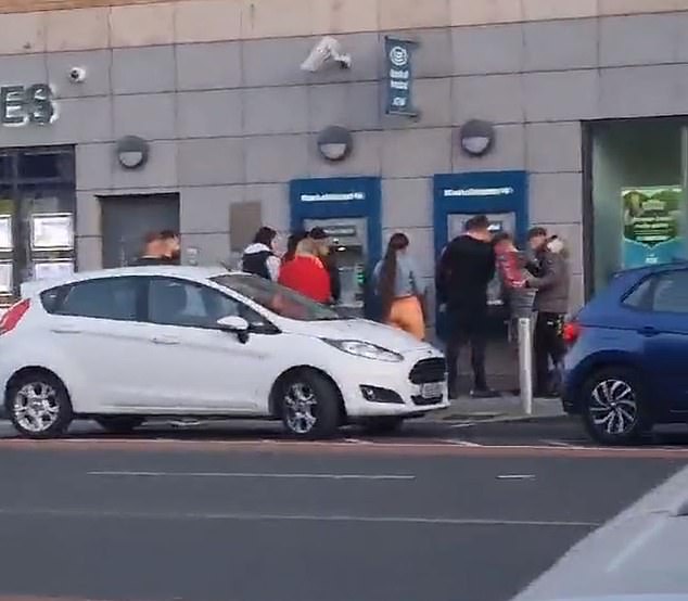 Thousands queue up as cash machines give out free money by mistake across Ireland: Police are sent to disperse customers taking advantage of IT glitch By the evening, customers had detected that they could access cash from ATMs despite having low levels of funds