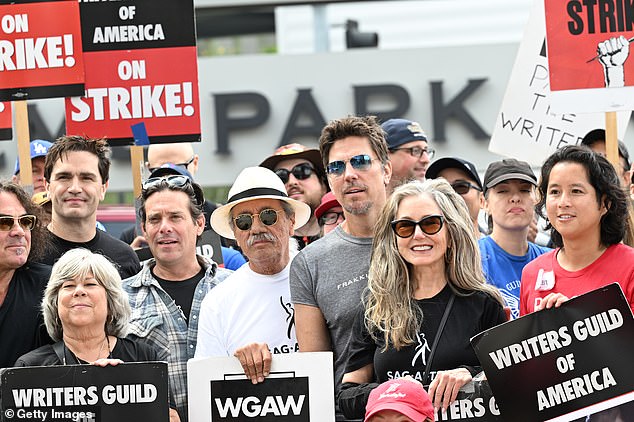 ‘Marathon session’ of negotiating ends WITHOUT a deal as Hollywood walkout continues Battlestar Galactica cast members Sam Witwer, James Callis, Edward James Olmos, Michael Trucco and Mary McDonnell pose with writers and fans at the "Battlestar Galactica" themed picket during the SAG-AFTRA and WGA Strike held at NBCUniversal on September 21