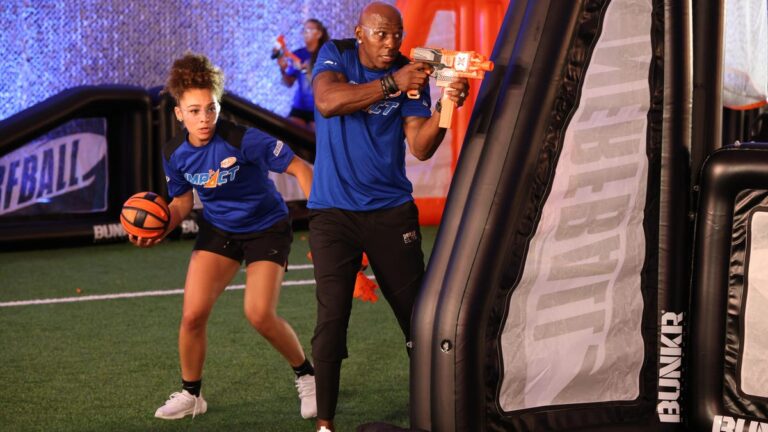 Nerf Launches Its Own Sport Using Hit-Detection Gear and Lots of Blasters Two Nerfball players with ball and blaster.