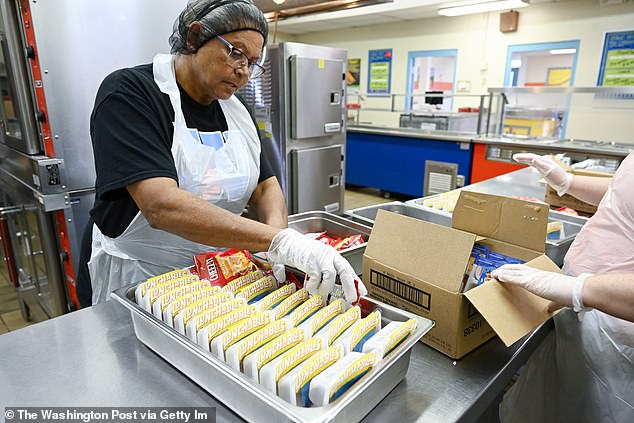Campaign launched to ban Lunchables from free school meals as report finds they contain toxic METALS A cafeteria worker prepares Lunchables for lunch at a school in Pembroke, North Carolina