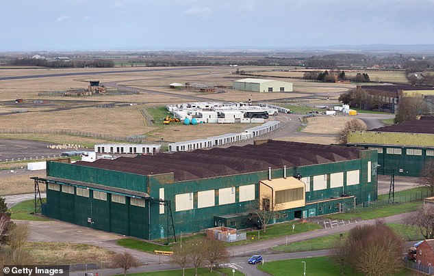 Controversial former RAF base earmarked for 2,000 asylum seekers finds ground gases and unexploded artillery on the land, minister claims Former military base RAF Scampton (pictured) earmarked to house 2,000 asylum seekers has had ground gases and unexploded artillery found on the land, a minister has claimed