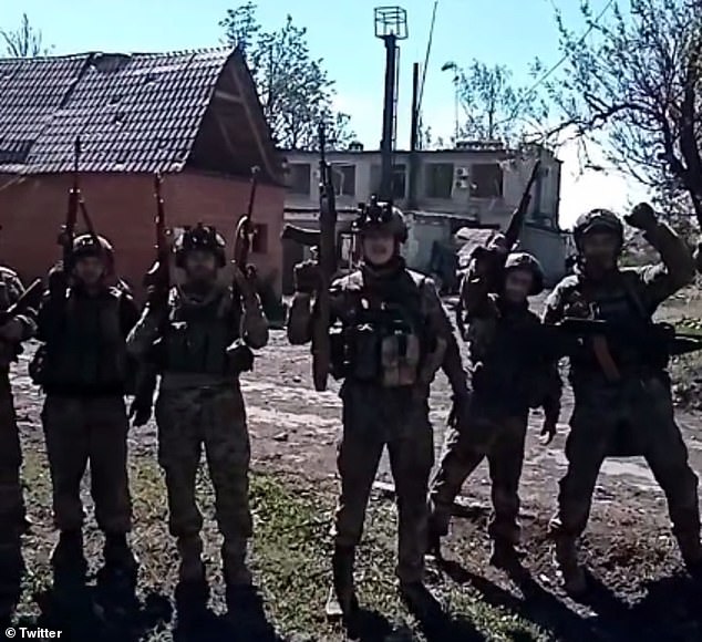 Russia breaks through Ukraine front line and captures strategically important town after ‘newly-arrived brigade fled their post’ in major blow to Kyiv – just as US finally approves huge aid package Russian troops are seen n Ocheretyne after raising the Russian flag atop a building