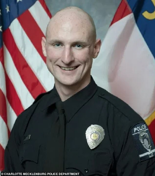 Neighbor films astonishing shootout between Charlotte cops and gunmen that left four officers dead and another four injured Charlotte police officer Joshua Eyer died Monday night. He was one of four officers killed