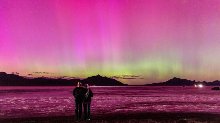 The sun is entering solar maximum. Expect auroras, and more An image showing beautiful pink and green auroras over Bonneville Salt Flats in Utah on May 10