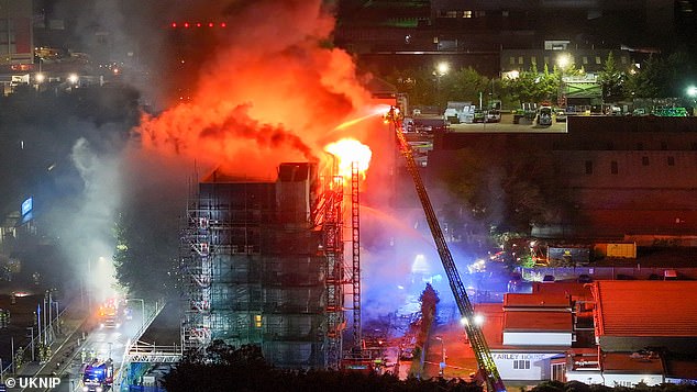 Dagenham fire: Search and rescue operation continues as fire crews declare London tower block blaze a major incident after two taken to hospital and more than 100 evacuated at building with ‘non-compliant cladding’ More than 100 people were evacuated from a high-rise block of flats which became engulfed in flames in the middle of the night