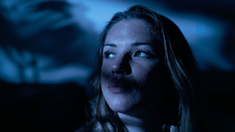 Peripheral vision and what we can see in the dark a shadowed image of a young woman looking to the side