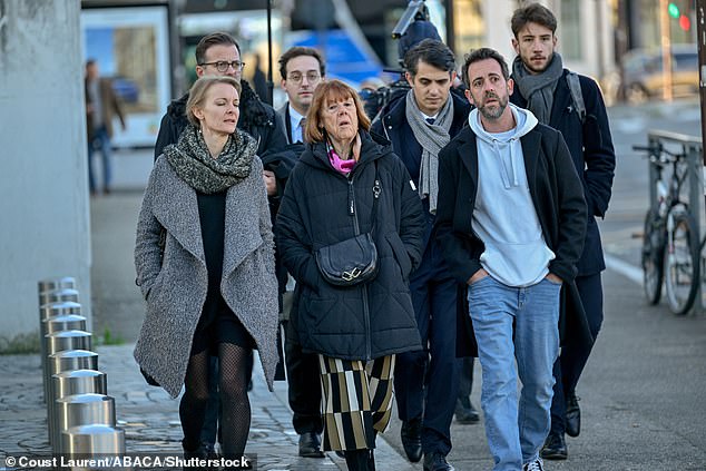Gisele Pelicot says she was ‘raped more than 200 times’ and ‘could have died’ during ordeal at the hands of ‘monster’ husband and dozens more as she condemns ‘macho’ French society Gisele Pelicot, flanked by her son Florian (R), arrives at the courthouse for a hearing in the trial on November 19