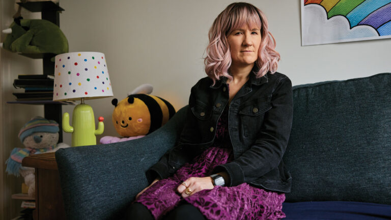 ‘It felt like dread.’ Hear what severe depression can do to people A photo of a woman sitting on a couch looking at the camera.