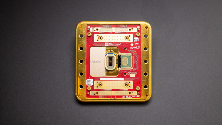 Physicists are mostly unconvinced by Microsoft’s new topological quantum chip A square, red and metallic device labeled "Majorana 1" sits on a gray background.