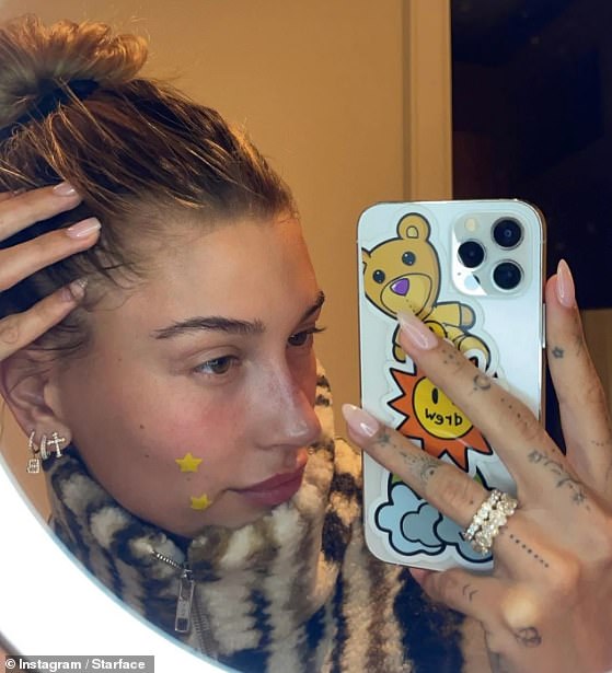 Acid burns, infections, dermal suffocation: Skin doctors reveal the hidden risks of Hollywood health craze Pimple patches went viral on social media a few years ago and boomed in popularity. Now everyone from Hailey Bieber (pictured) to strangers on the street are wearing them.