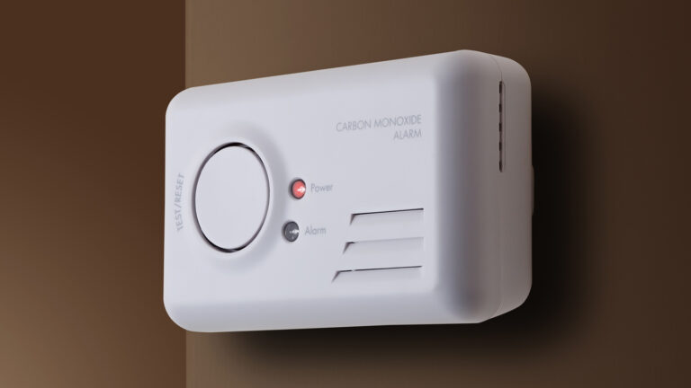 A bioengineered protein may someday treat carbon monoxide poisoning A white carbon monoxide monitor is shown mounted on a dark brown wall. The alarm has a large white button to "test/reset" on the left. To the right of the button are two round indicators for "power" and "alarm"