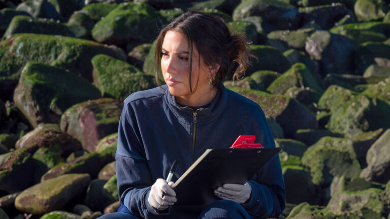 A shark encounter inspired this researcher’s career in marine biology Shark researcher Heidy Martinez stands in front of a rocky coast.