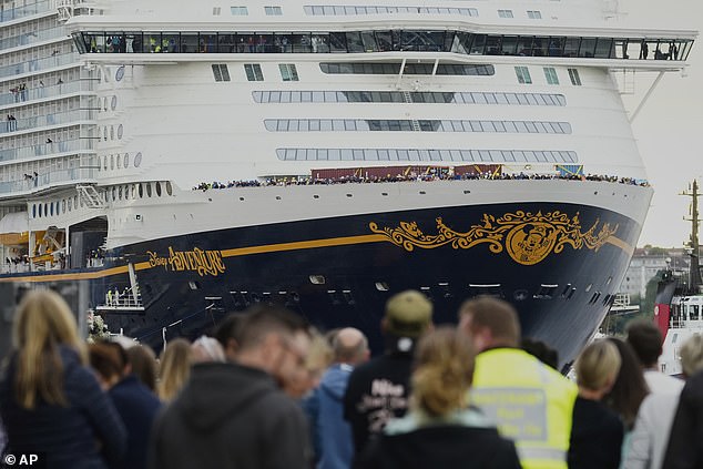Police storm Disney’s giant new cruise ship as it docks in Germany days after vessel was launched Spectators watch the departure of the Disney Adventure cruise ship from the MV Werften shipyards at the harbour in Wismar, Germany, Monday, Sept. 1, 2025