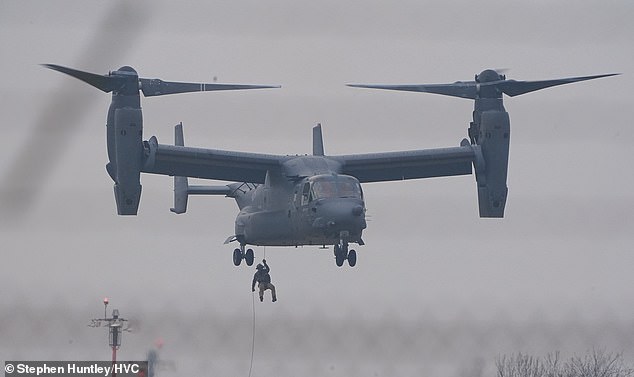 Prepping to attack Iran? US ‘nuke sniffer’ plane arrives in Britain and special forces rehearse ‘fast roping’ from aircraft as Trump weighs up going after the Ayatollah Special forces have been seen practicing 'fast roping' from an V-22 Osprey aircraft