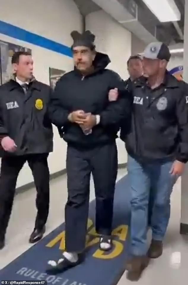 Smirking Maduro makes first public remarks as handcuffed Venezuelan dictator arrives in New York Venezuelan President Nicolas Maduro has been seen perp walking down a hallway in an official building in Manhattan, almost 24 hours after he was seized by US troops, as shown above